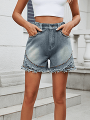 Ladies washed casual denim rivet raw edge shorts