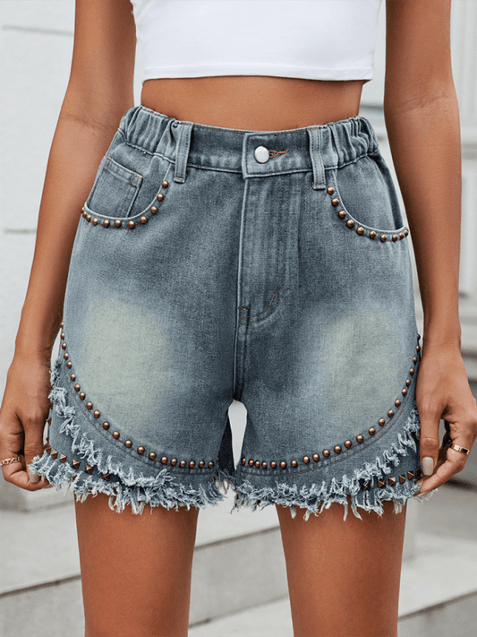 Ladies washed casual denim rivet raw edge shorts